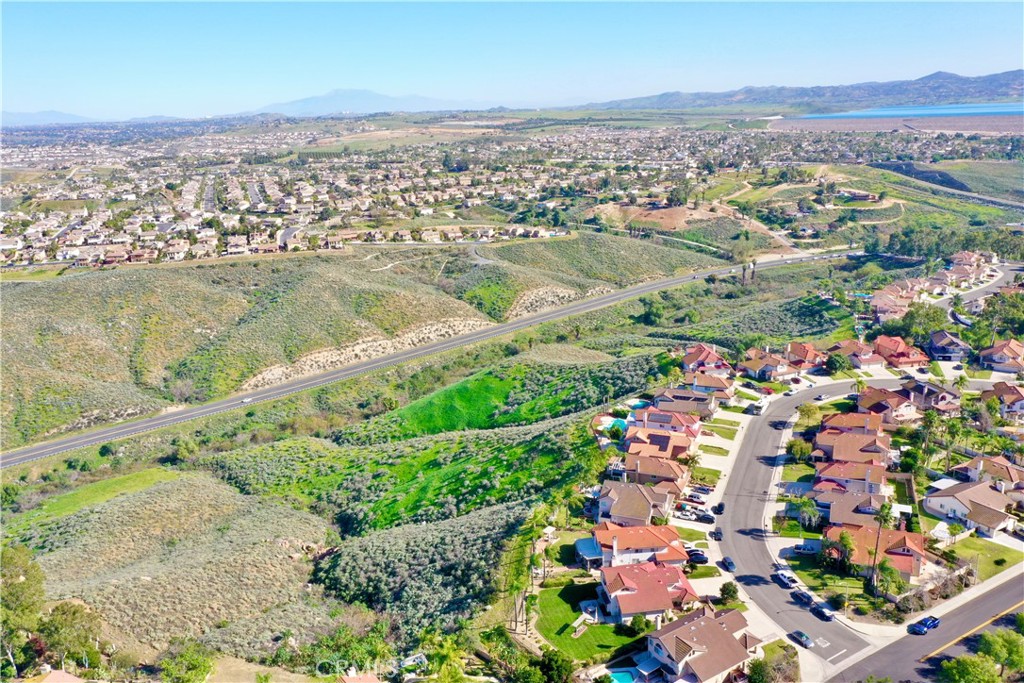 17401 La Sierra Avenue Riverside, CA 92503 - Photo 10 of 16 an aerial view of lake and residential houses with outdoor space