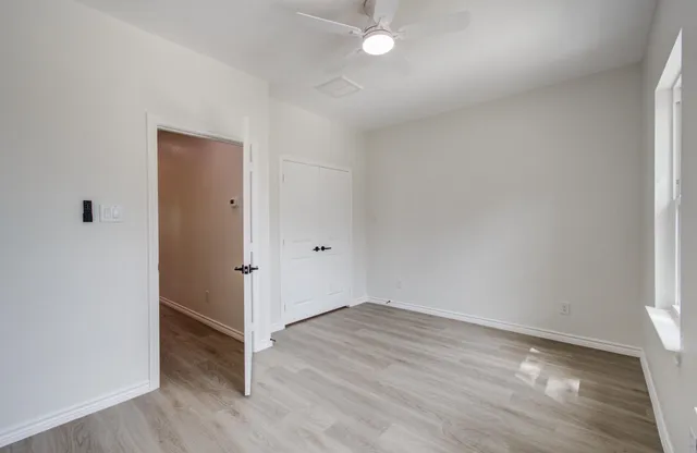 a view of a back yard of the house