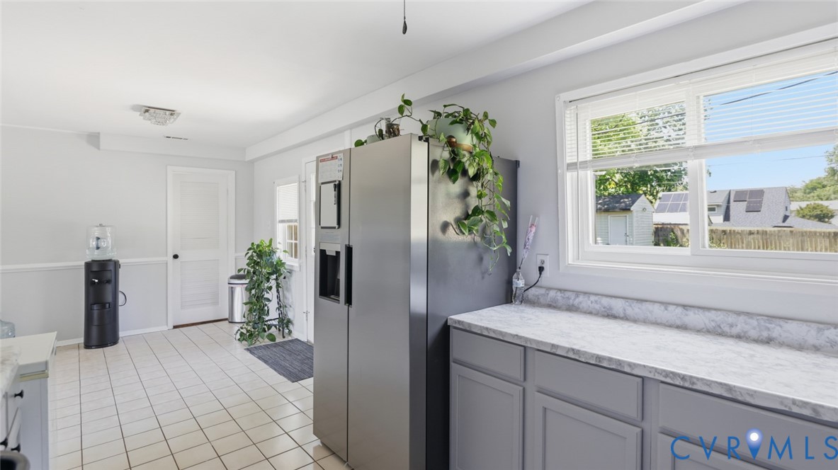 1310 Andover Road Henrico, VA 23229 - Photo 15 of 43 Kitchen with white tiled flooring, gray lower cabi