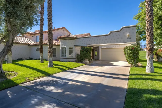 a house view with a outdoor space