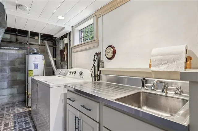 a kitchen with a stove and a sink
