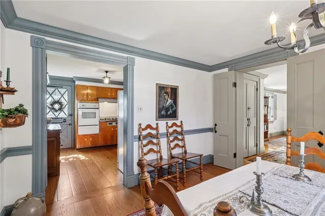 a view of a livingroom with furniture and gym equipment