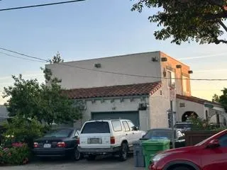 a car parked in front of a house