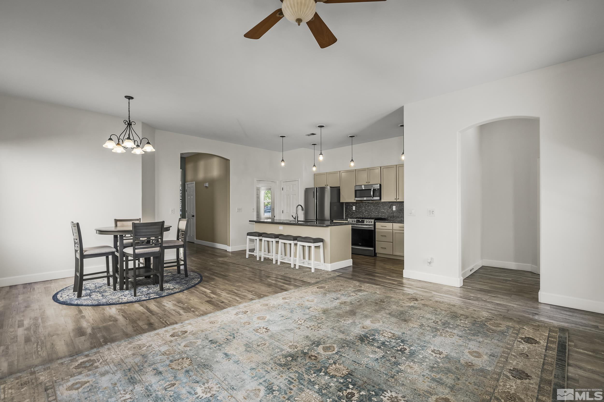 10245 Grizzly Hill Court Reno, NV 89521 - Photo 11 of 40 a view of a dining room with furniture