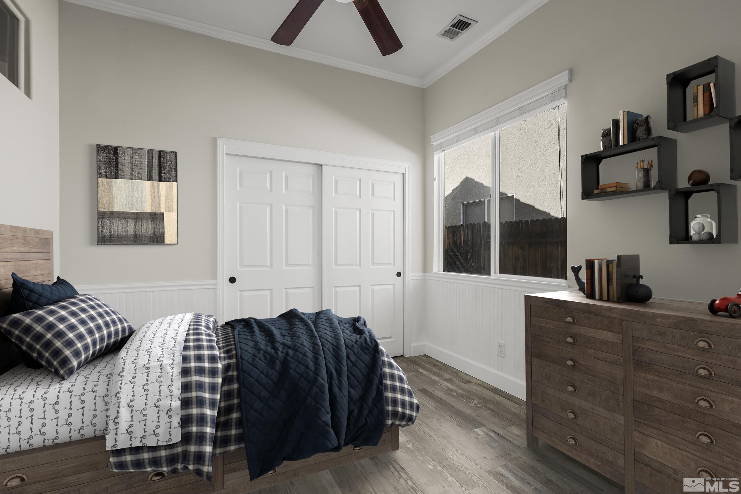 10245 Grizzly Hill Court Reno, NV 89521 - Photo 18 of 40 a bedroom with a bed and window