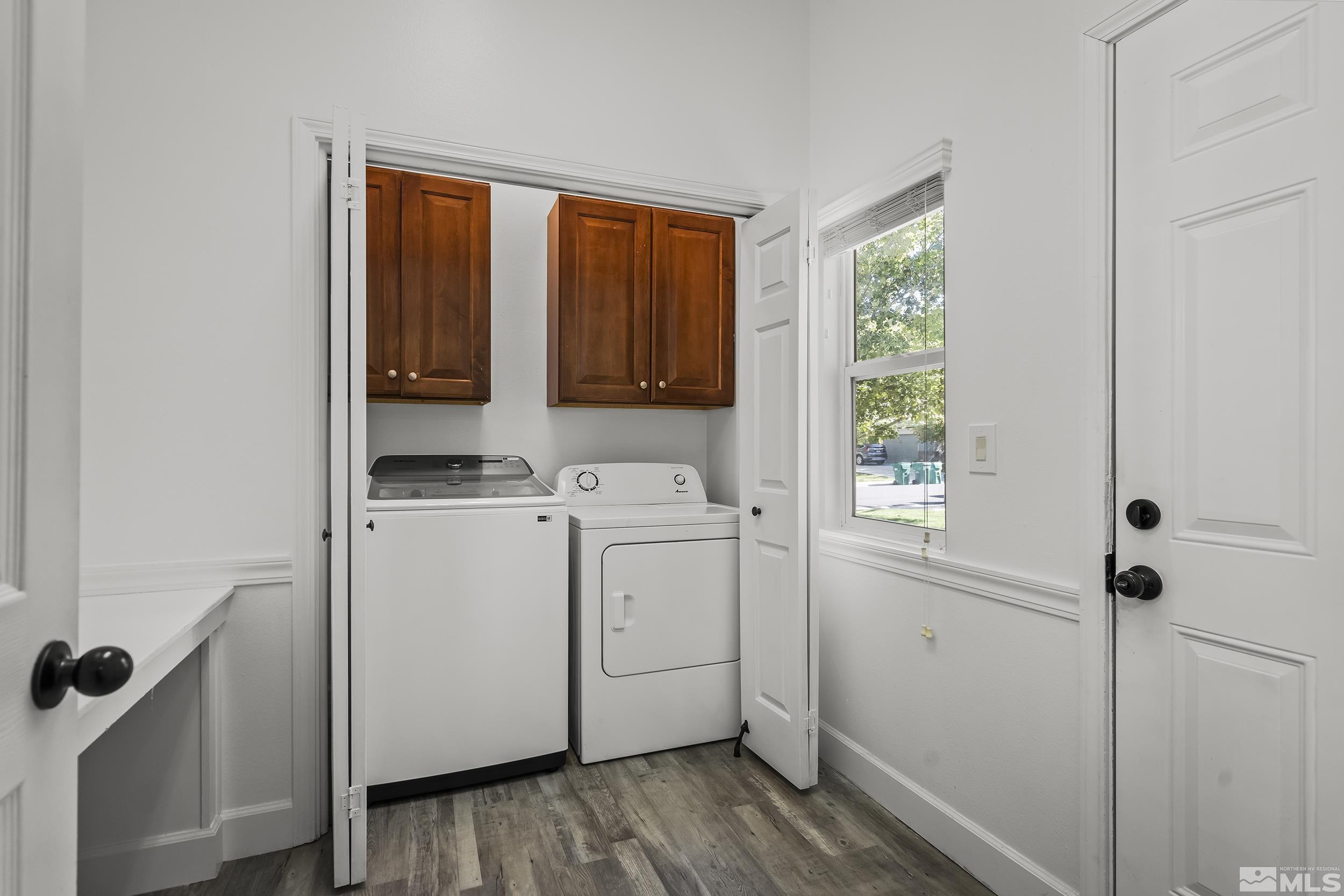 10245 Grizzly Hill Court Reno, NV 89521 - Photo 25 of 40 a view of storage and utility room with washer and dryer