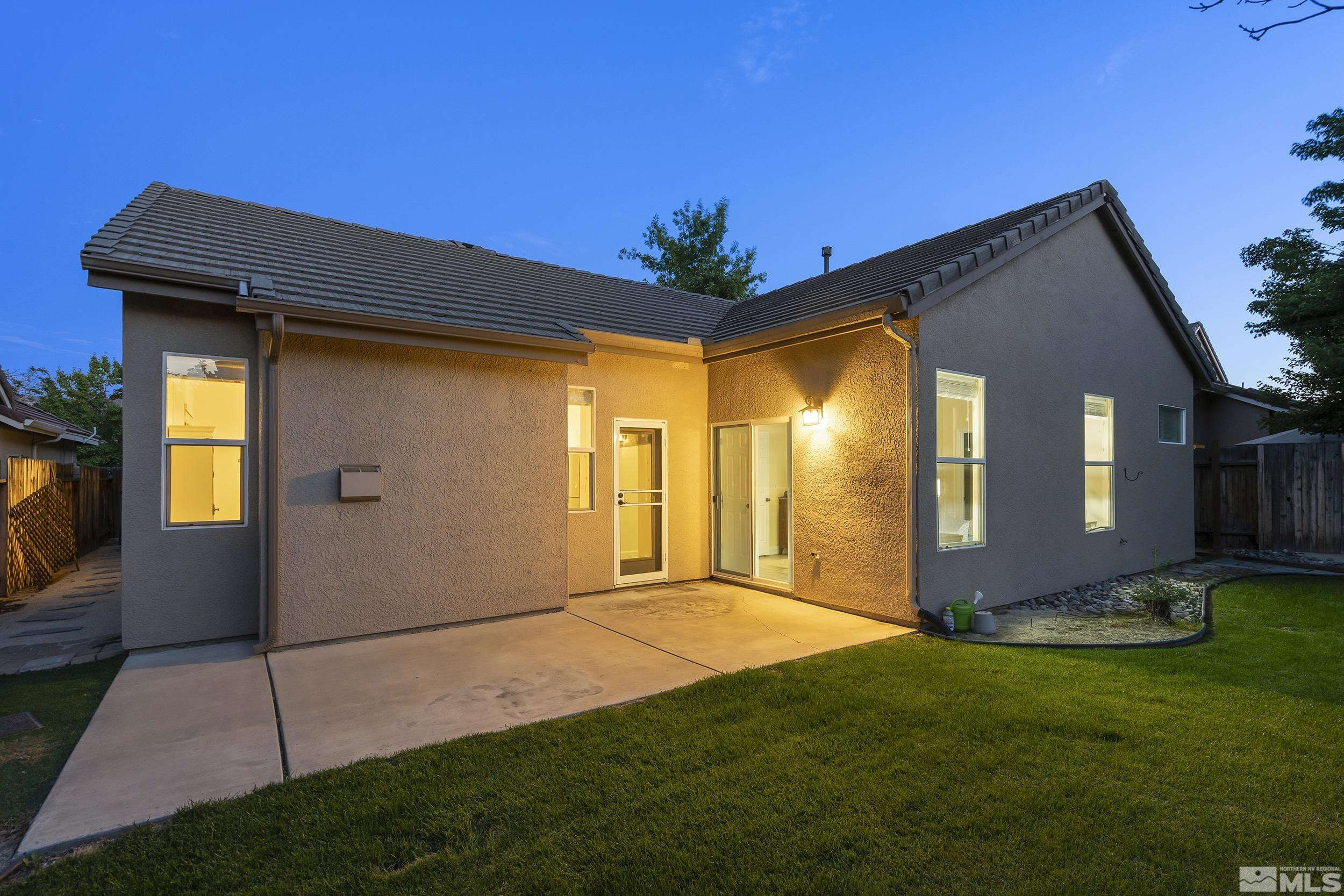 10245 Grizzly Hill Court Reno, NV 89521 - Photo 27 of 40 a front view of house with yard