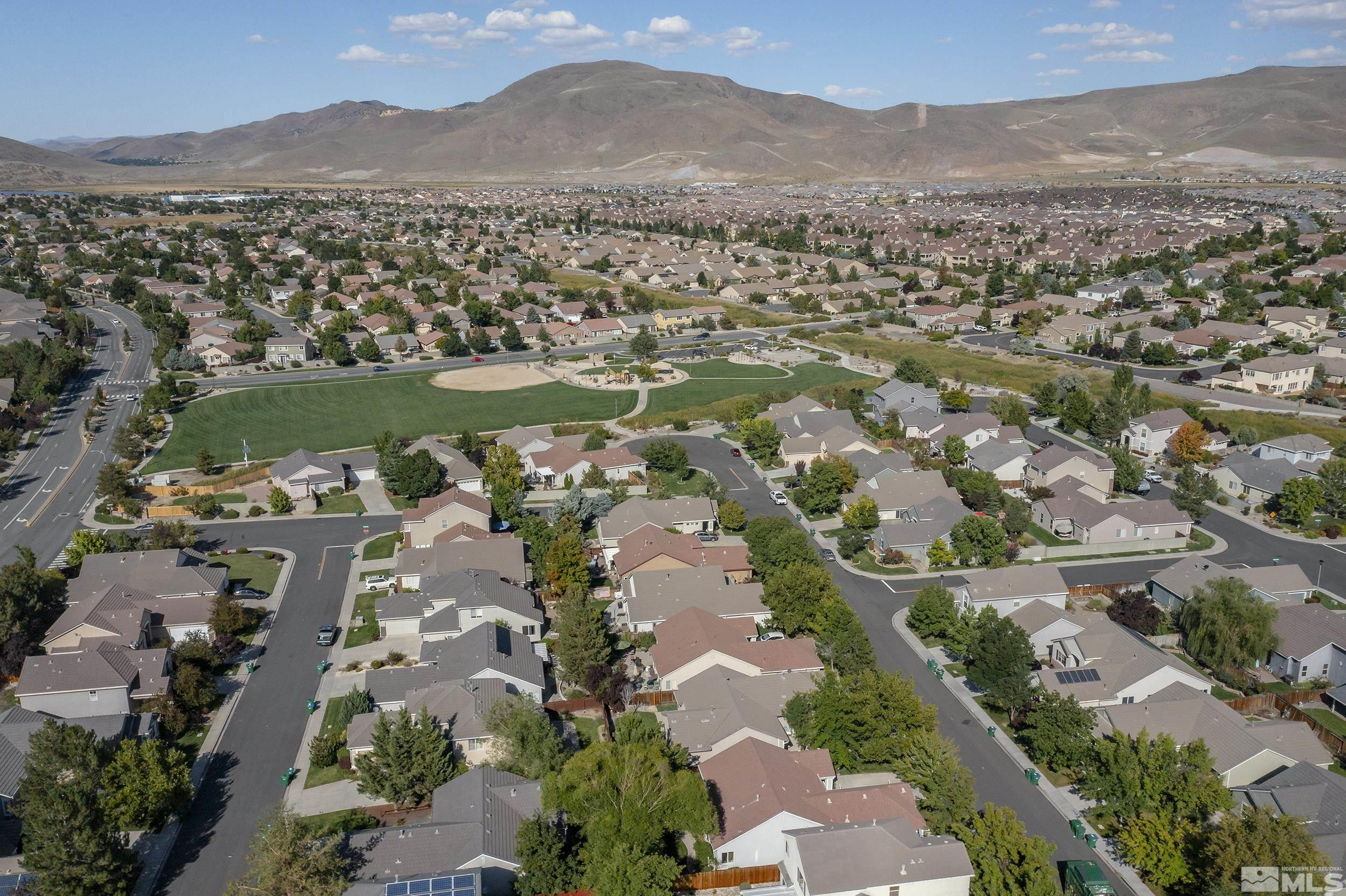 10245 Grizzly Hill Court Reno, NV 89521 - Photo 34 of 40 an aerial view of a city with lots of residential buildings