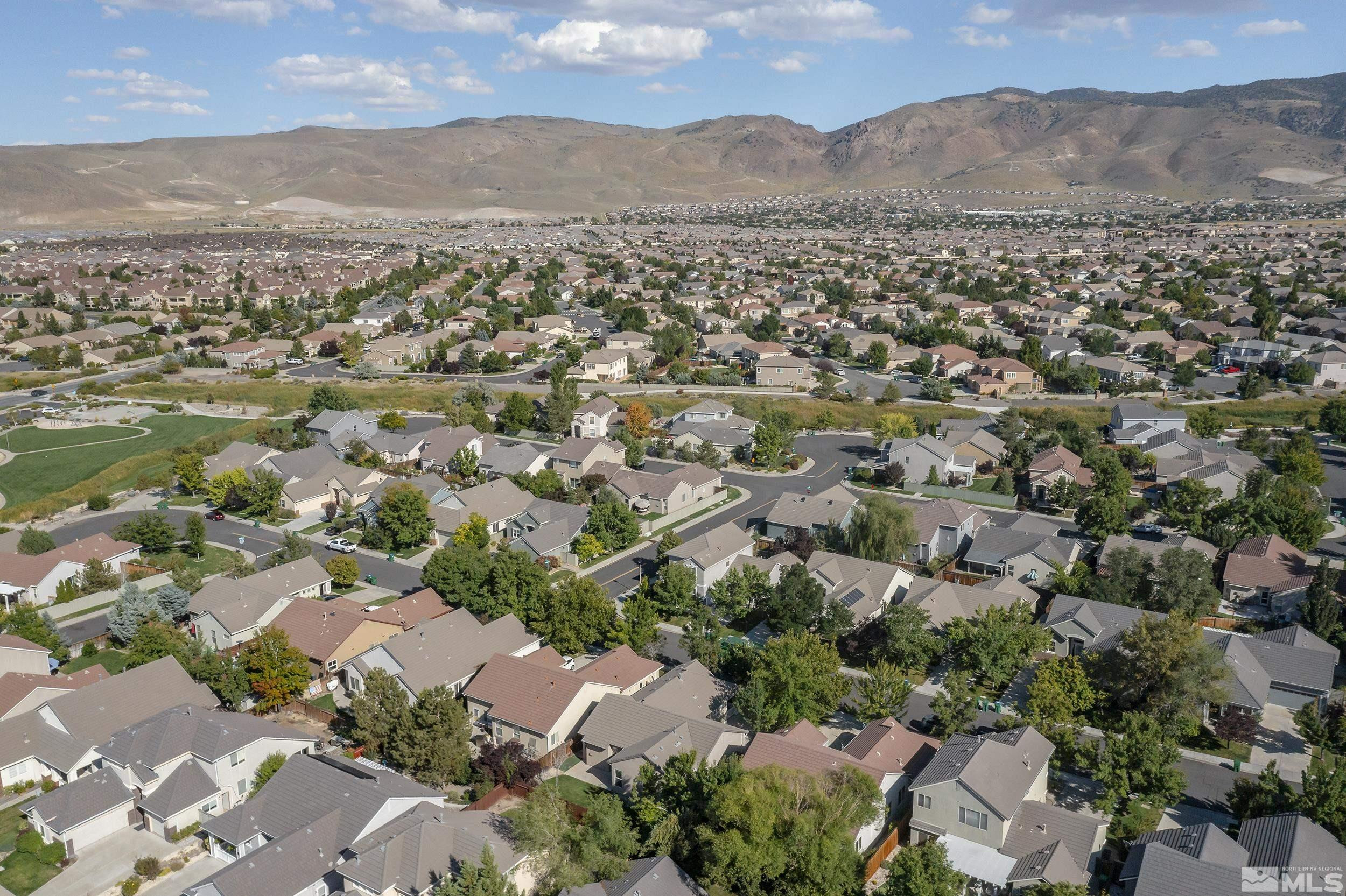 10245 Grizzly Hill Court Reno, NV 89521 - Photo 36 of 40 an aerial view of residential houses with outdoor space and trees