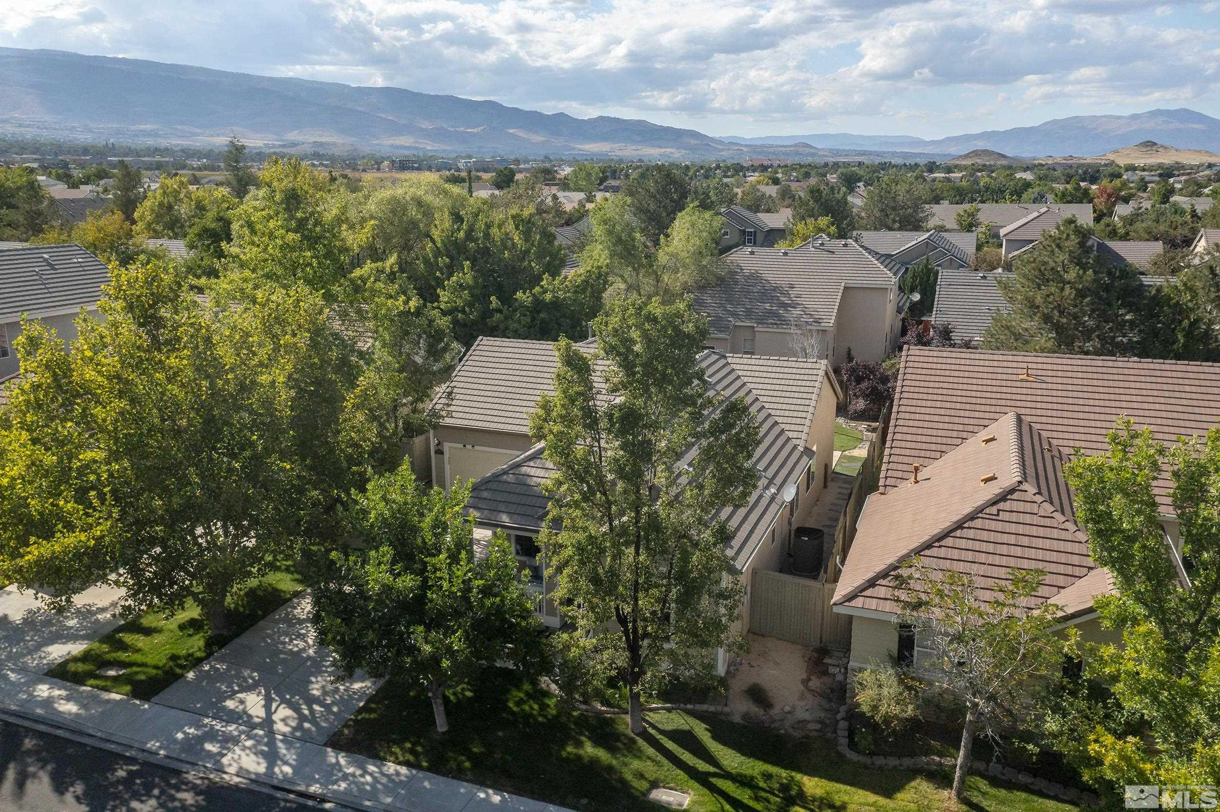10245 Grizzly Hill Court Reno, NV 89521 - Photo 38 of 40 a view of a house with a yard