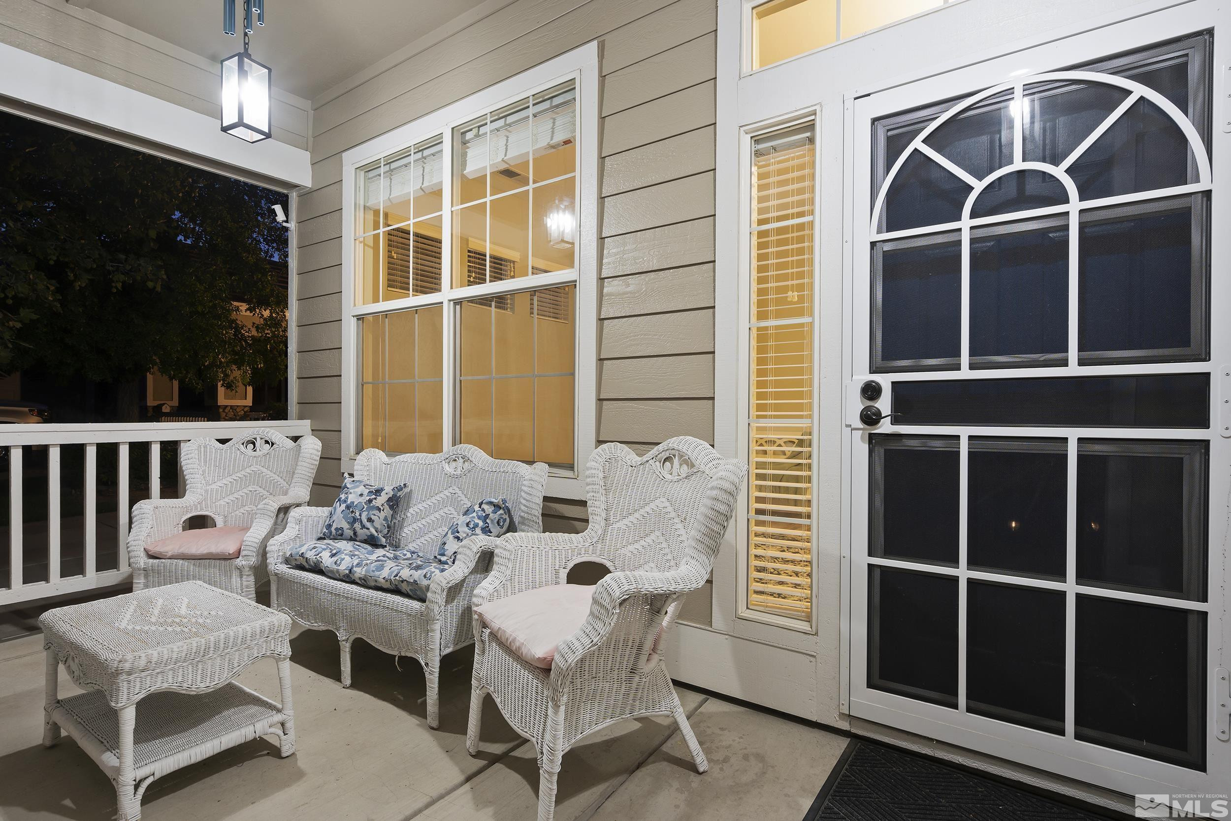 10245 Grizzly Hill Court Reno, NV 89521 - Photo 4 of 40 a outdoor living space with furniture and a window