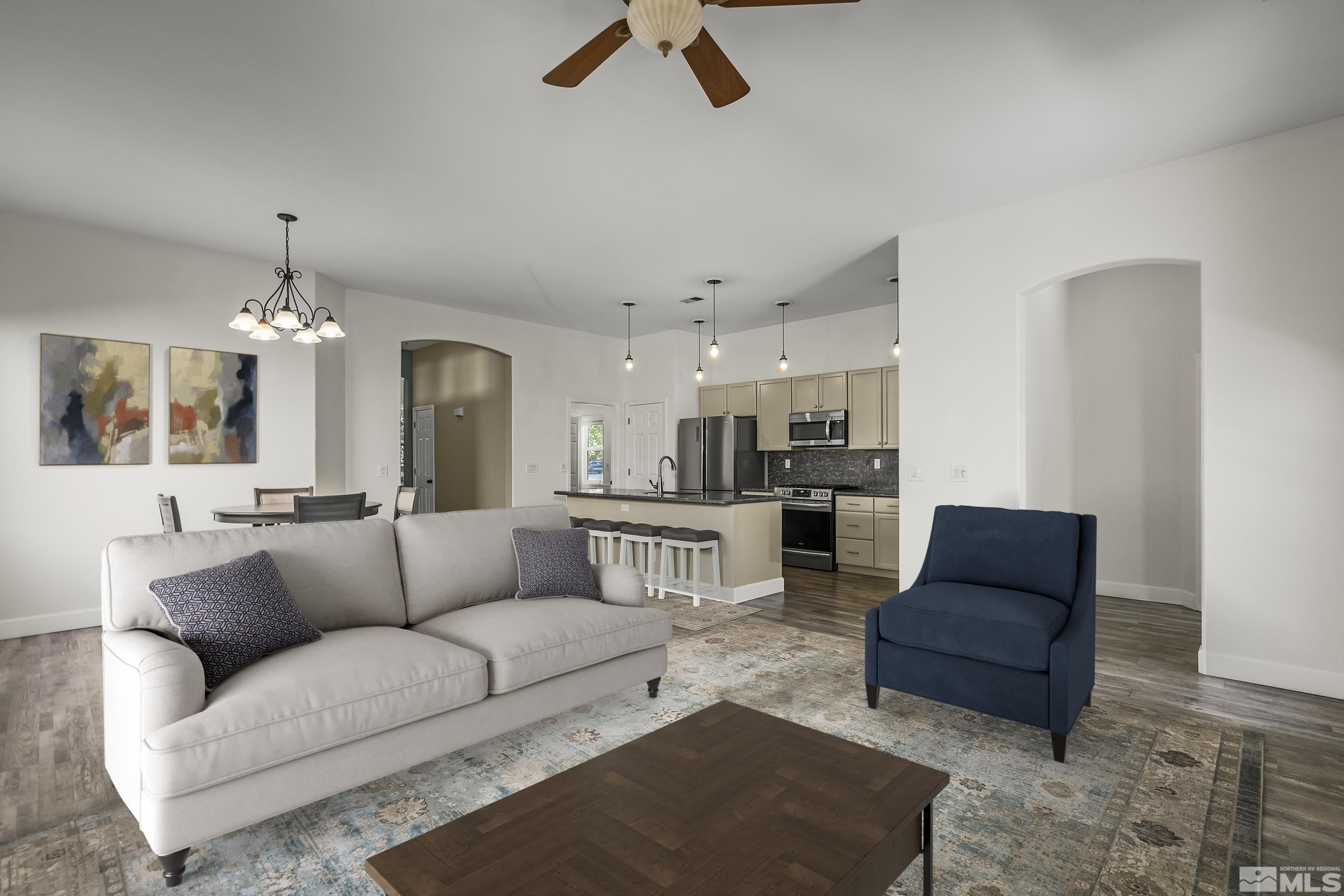 10245 Grizzly Hill Court Reno, NV 89521 - Photo 10 of 40 a living room with furniture and view of kitchen