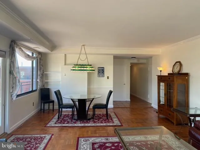 a view of a dining room with furniture