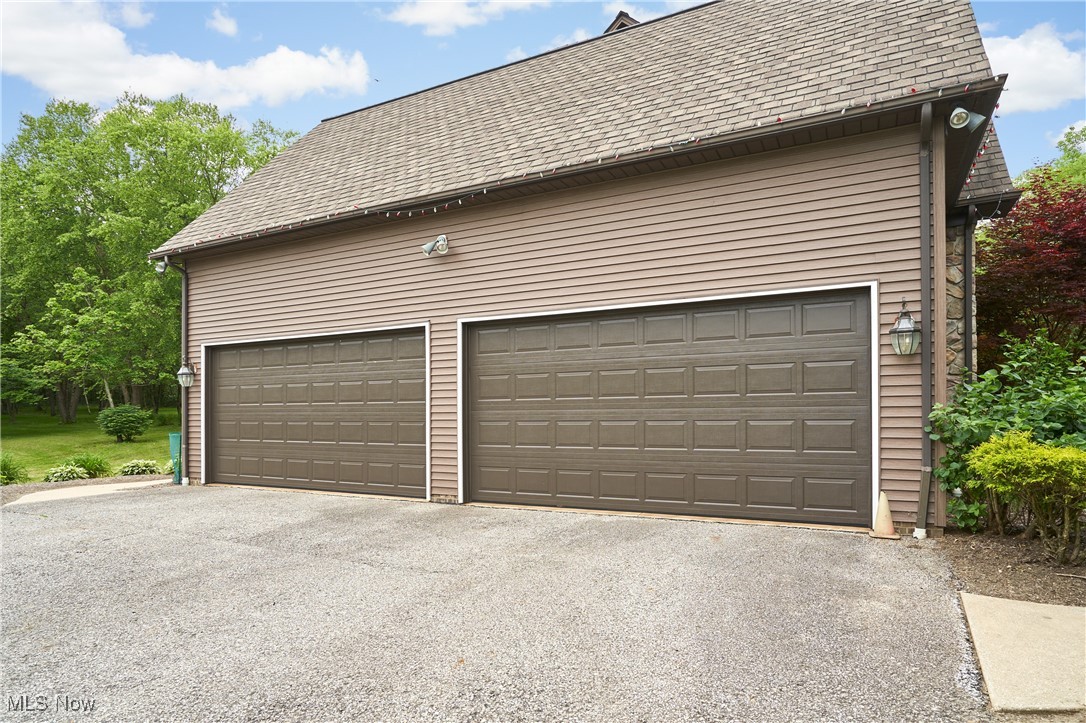 5968 Winchell Road Hiram, OH 44234 - Photo 6 of 43 4 car attached garage with 8ft doors