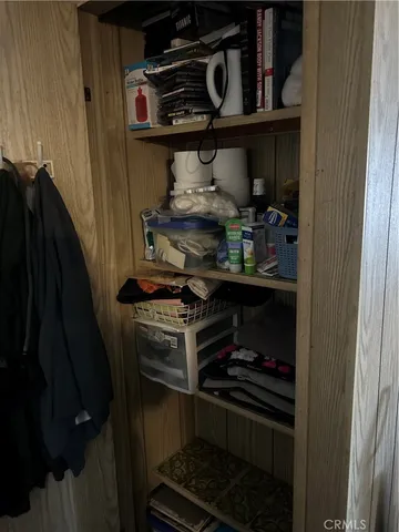 a kitchen with a stove and cabinets