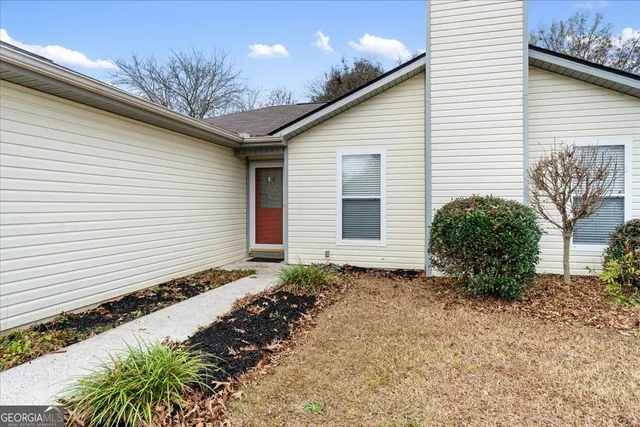 a view of a room that has a window in it