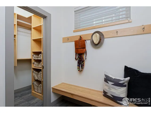 a view of wooden floor and windows in a room