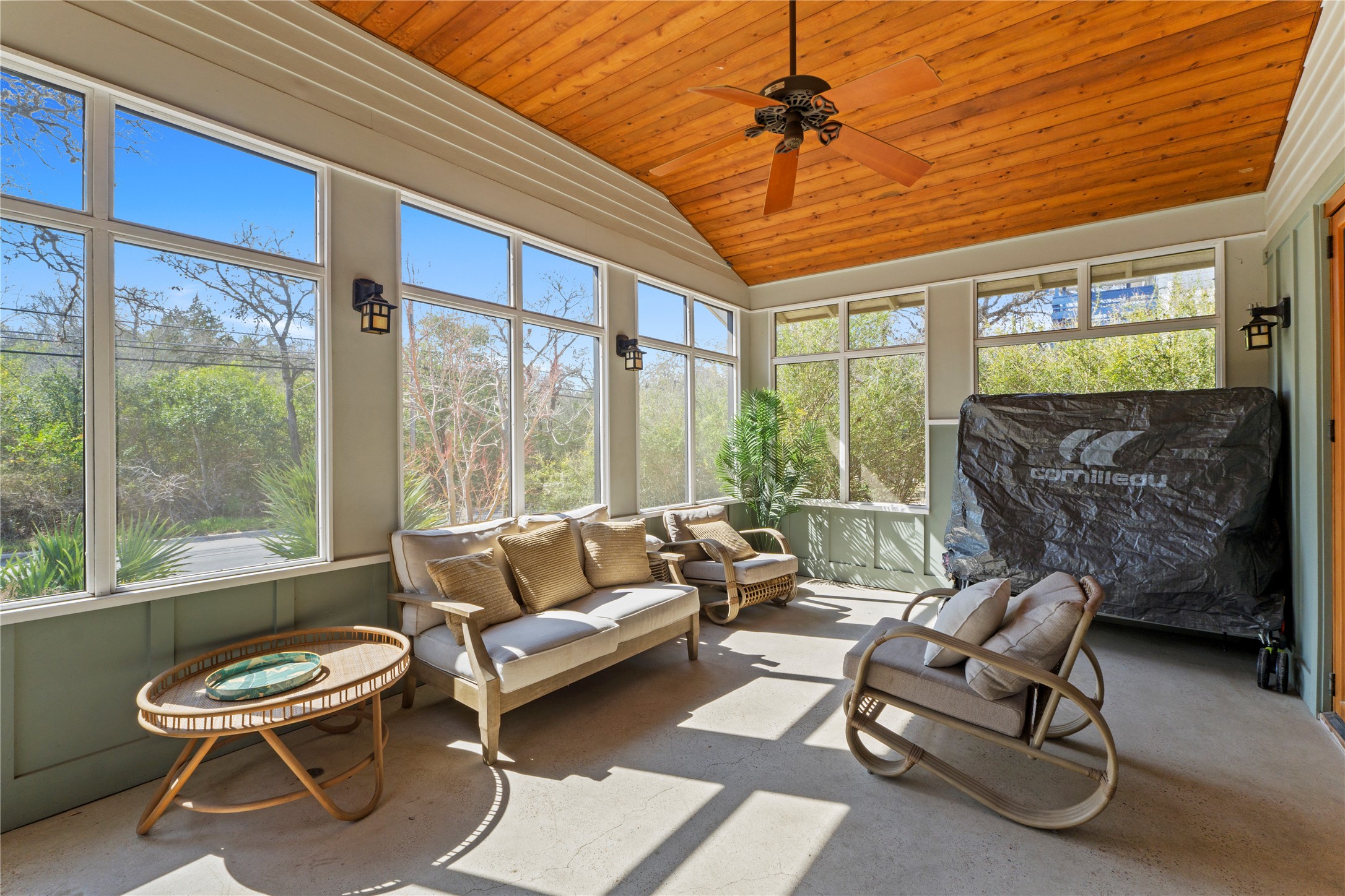 1706 West 10th Street Austin, TX 78703 - Photo 13 of 31 a living room with furniture and a floor to ceiling window