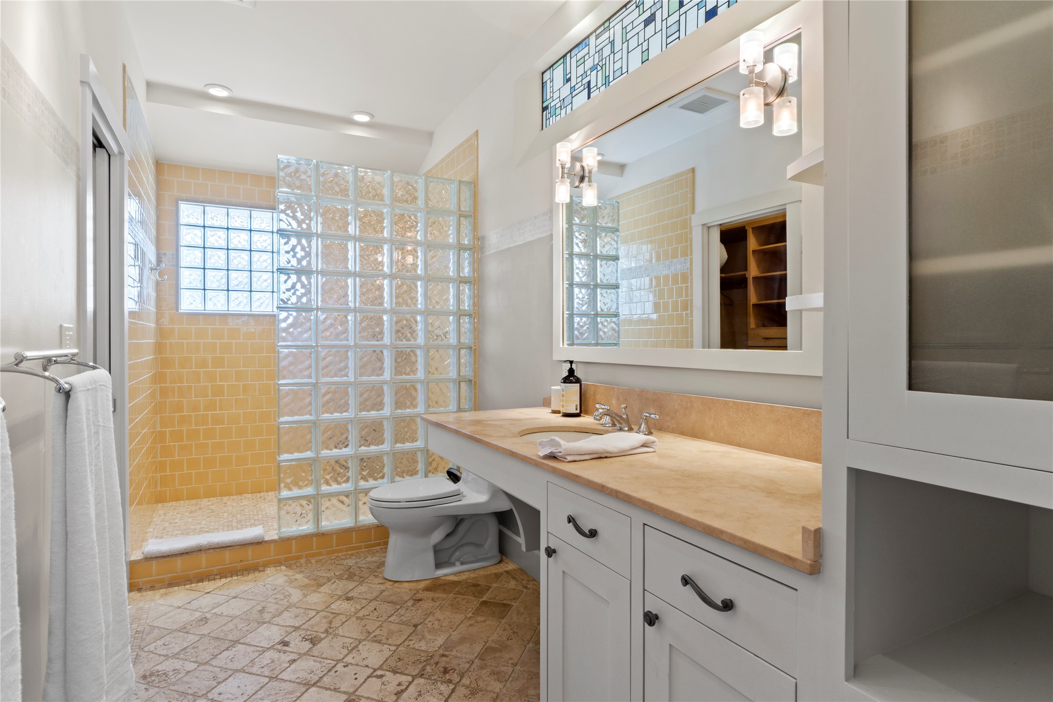 1706 West 10th Street Austin, TX 78703 - Photo 20 of 31 a bathroom with a sink toilet and shower