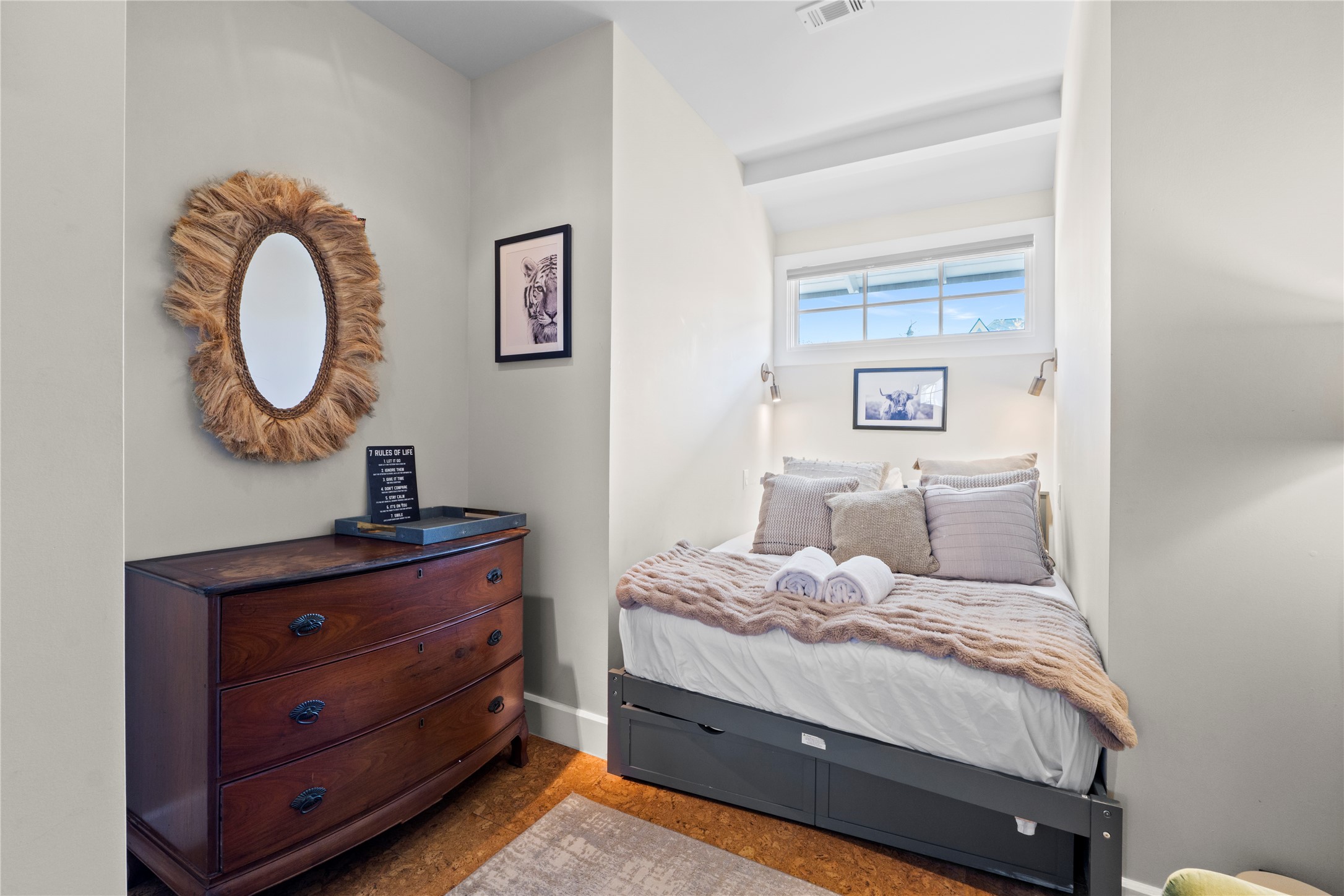1706 West 10th Street Austin, TX 78703 - Photo 24 of 31 a bedroom with a bed and a dresser