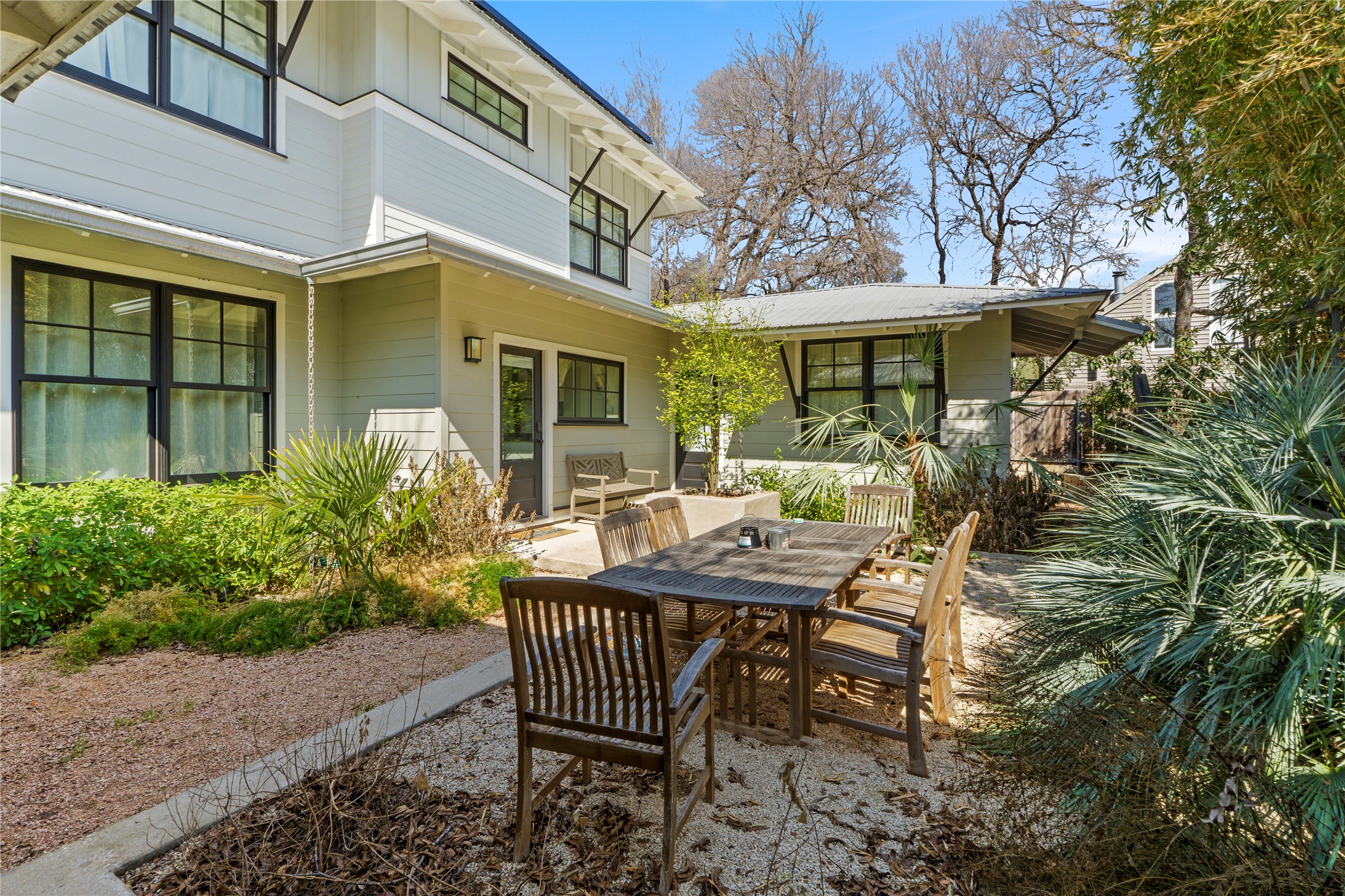 1706 West 10th Street Austin, TX 78703 - Photo 27 of 31 a view of a house with backyard and sitting area