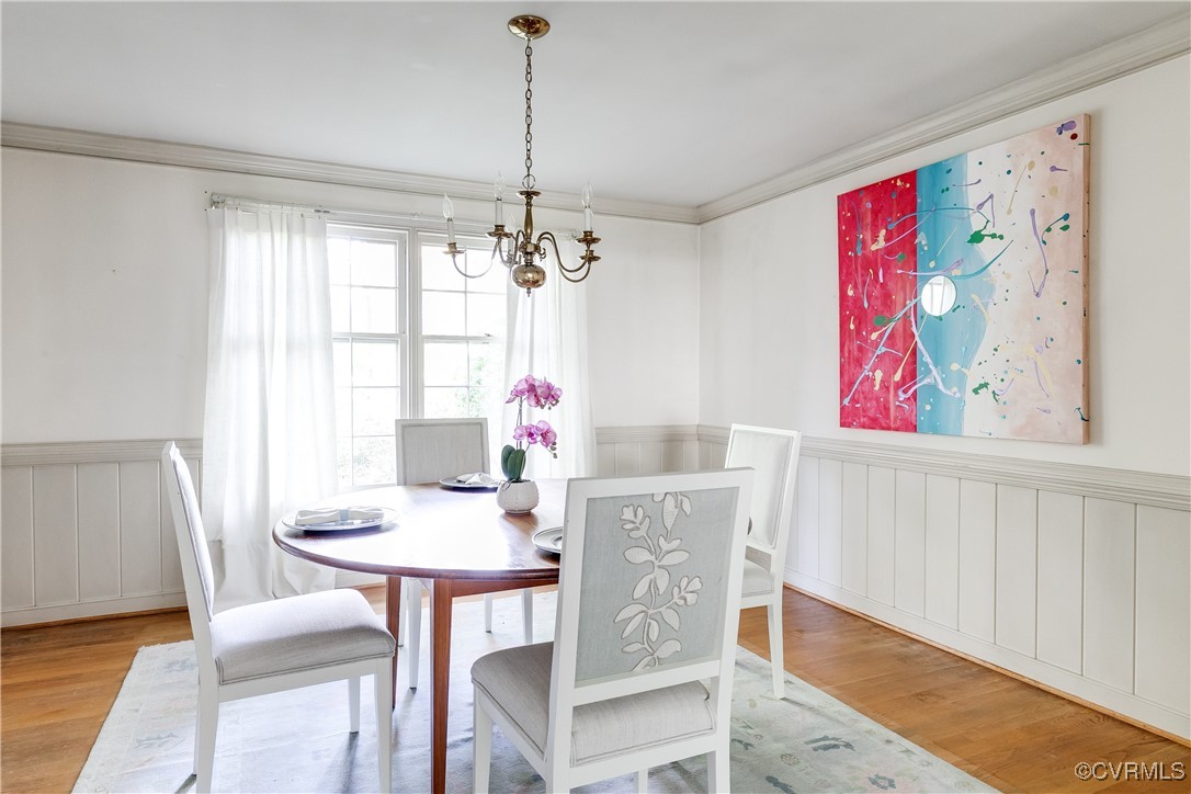 201 Wood Road Henrico, VA 23229 - Photo 12 of 40 a view of a dining room with furniture window and wooden floor