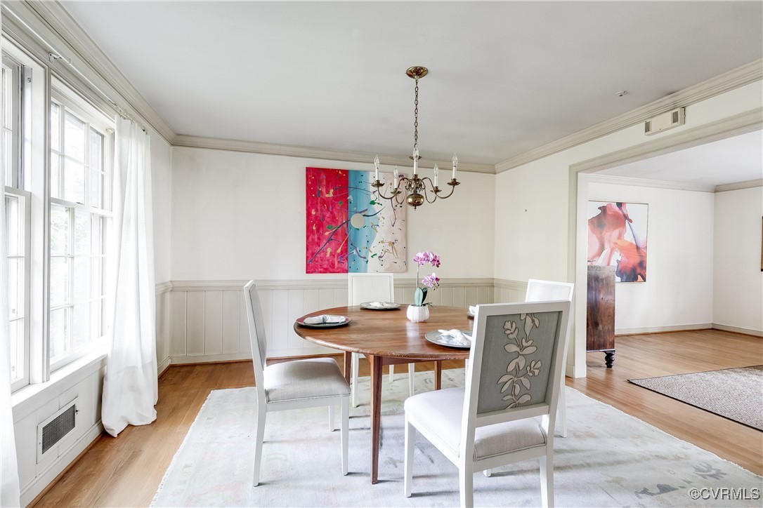 201 Wood Road Henrico, VA 23229 - Photo 13 of 40 a view of a dining room with furniture window and wooden floor