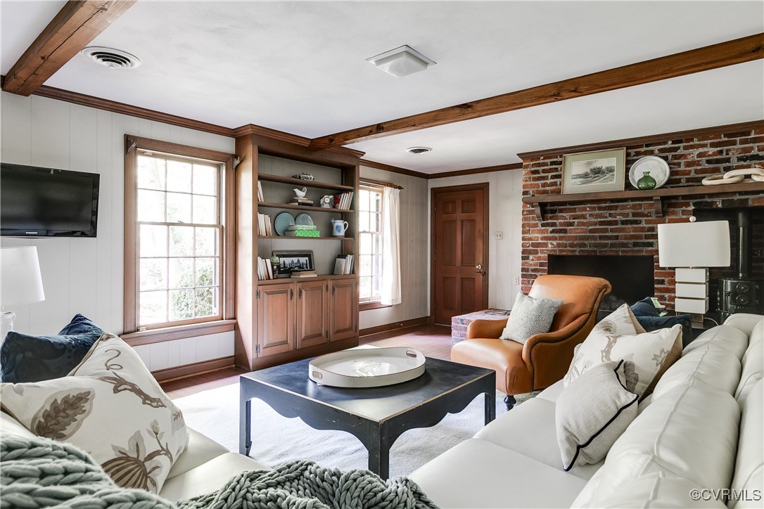 201 Wood Road Henrico, VA 23229 - Photo 17 of 40 a living room with furniture and a flat screen tv