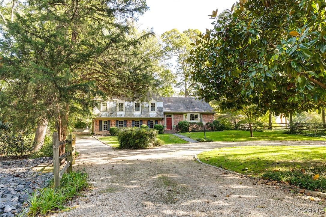 201 Wood Road Henrico, VA 23229 - Photo 4 of 40 a view of a house with a big yard and large trees