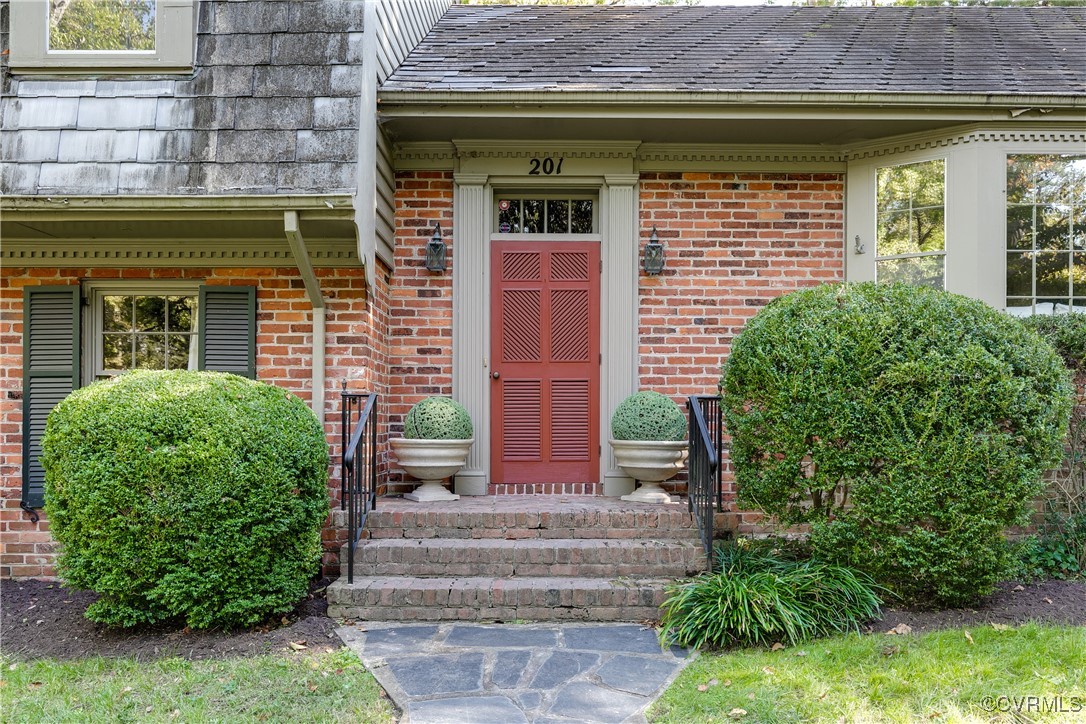 201 Wood Road Henrico, VA 23229 - Photo 5 of 40 a front view of a house with garden
