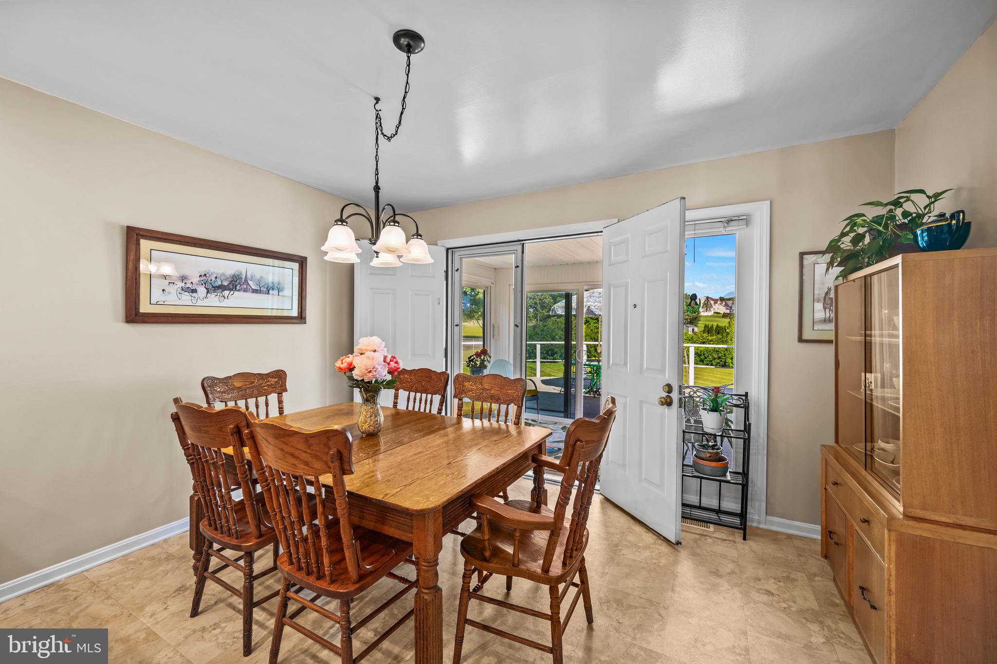 1030 Gist Road Westminster, MD 21157 - Photo 16 of 43 Dining area with sunroom & deck access