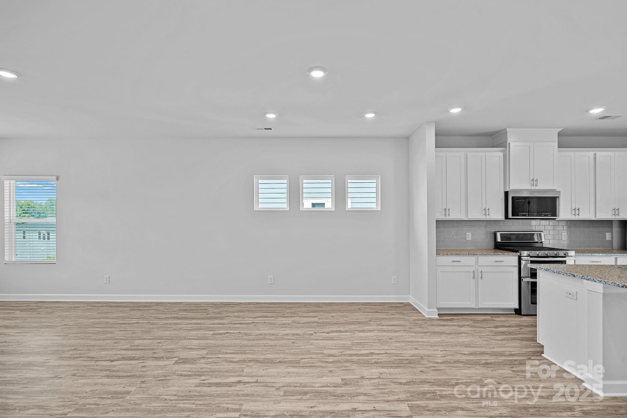 2426 Arbor Loop Drive Charlotte, NC 28217 - Photo 11 of 23 a view of a kitchen with a sink