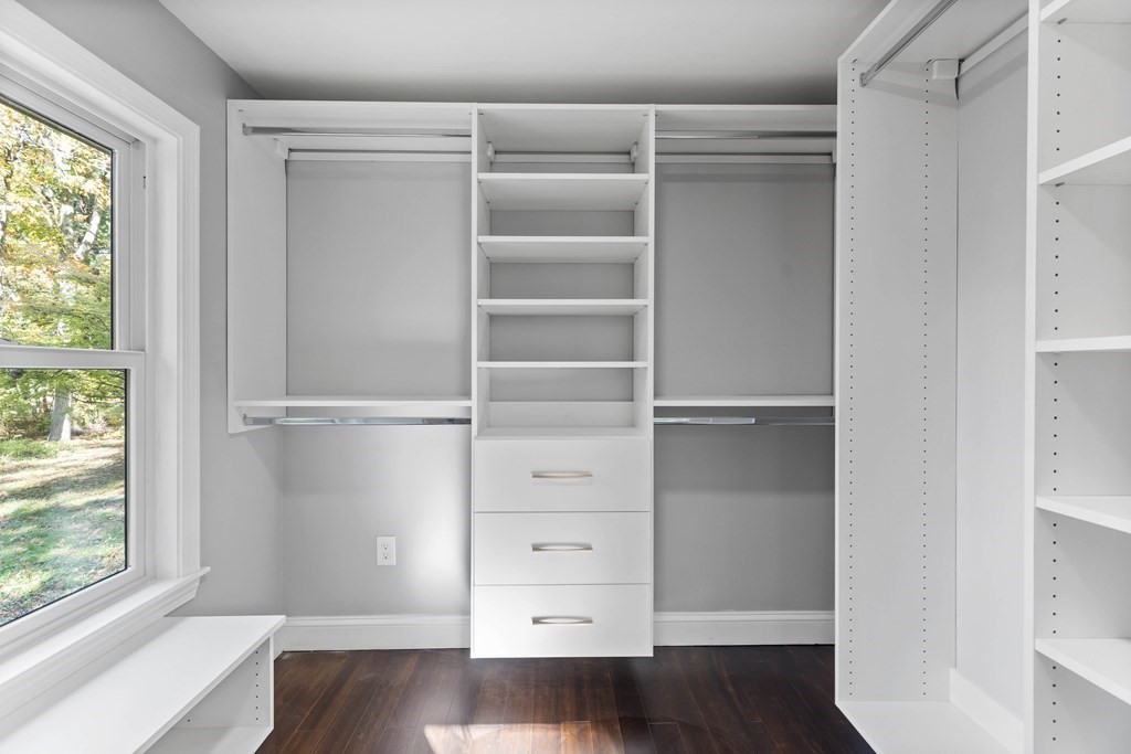 8 Edgewater Drive Dover, MA 02030 - Photo 13 of 31 a view of walk in closet with empty racks