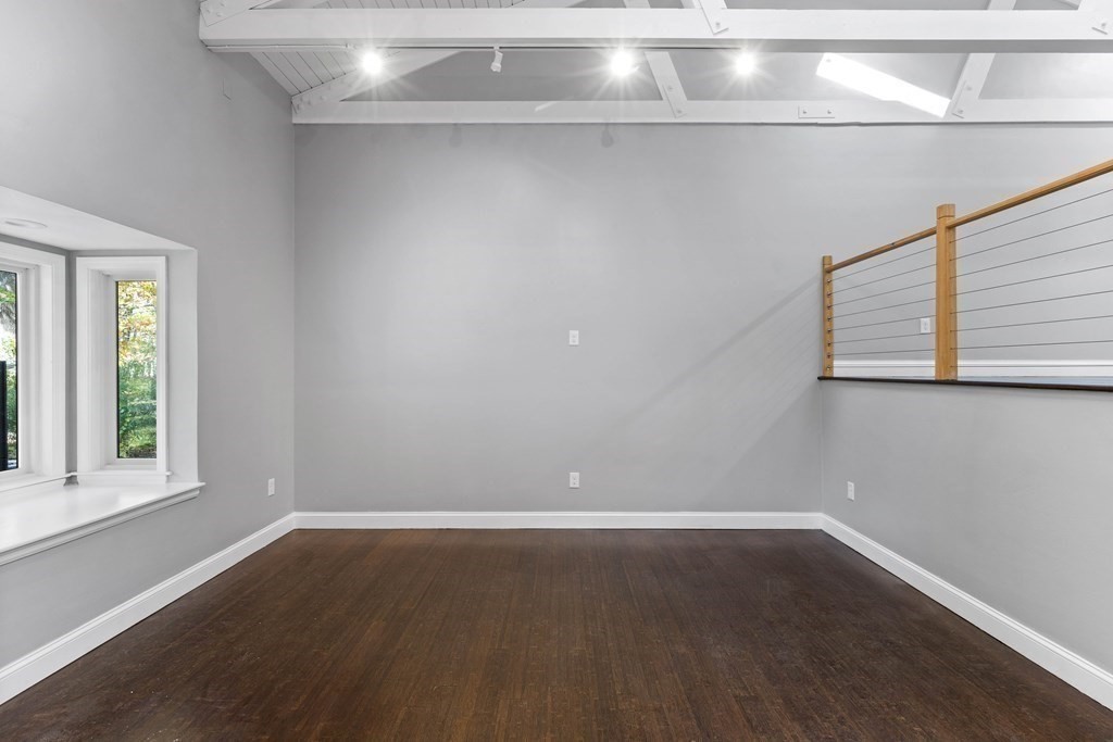 8 Edgewater Drive Dover, MA 02030 - Photo 14 of 31 a view of a room that has wooden floor and window