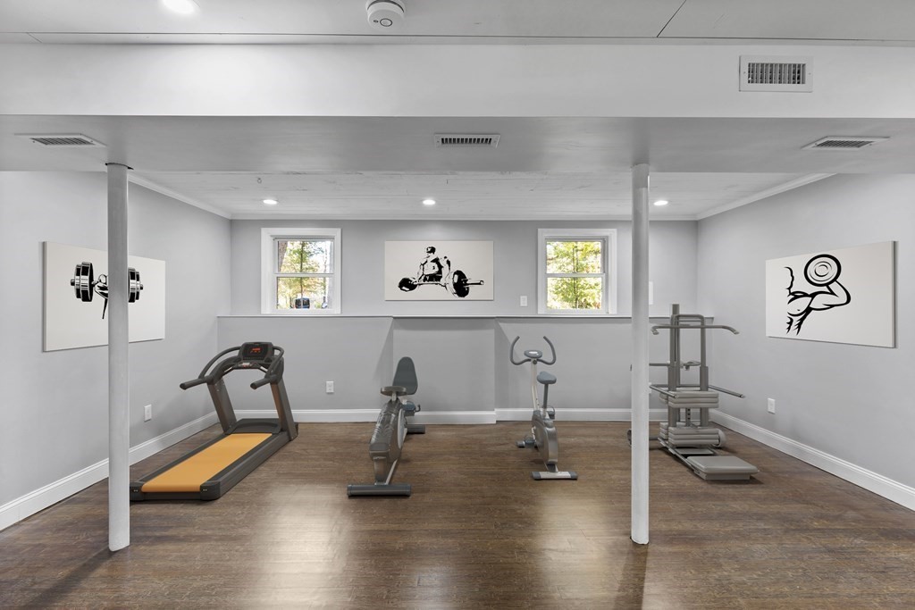 8 Edgewater Drive Dover, MA 02030 - Photo 20 of 31 a view of a room with gym equipment