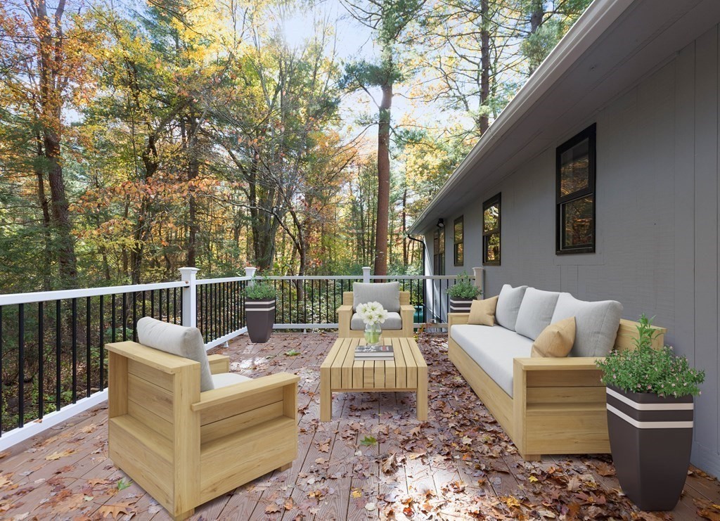 8 Edgewater Drive Dover, MA 02030 - Photo 26 of 31 a view of a patio with couches chairs and a potted plant