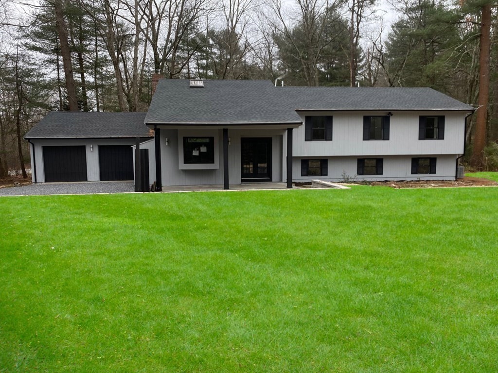8 Edgewater Drive Dover, MA 02030 - Photo 27 of 31 a view of a white house that has a yard in front of it
