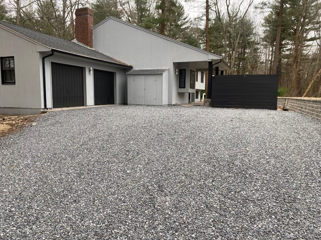 8 Edgewater Drive Dover, MA 02030 - Photo 29 of 31 a view of a house with a yard and garage