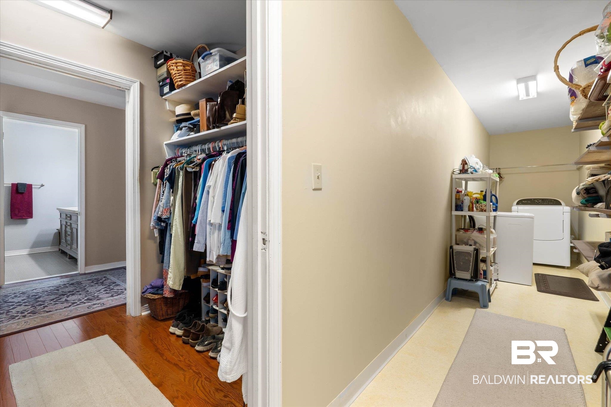 559 East Cumberland Road Mobile, AL 36608 - Photo 28 of 48 Laundry area featuring baseboards and light wood-type flooring