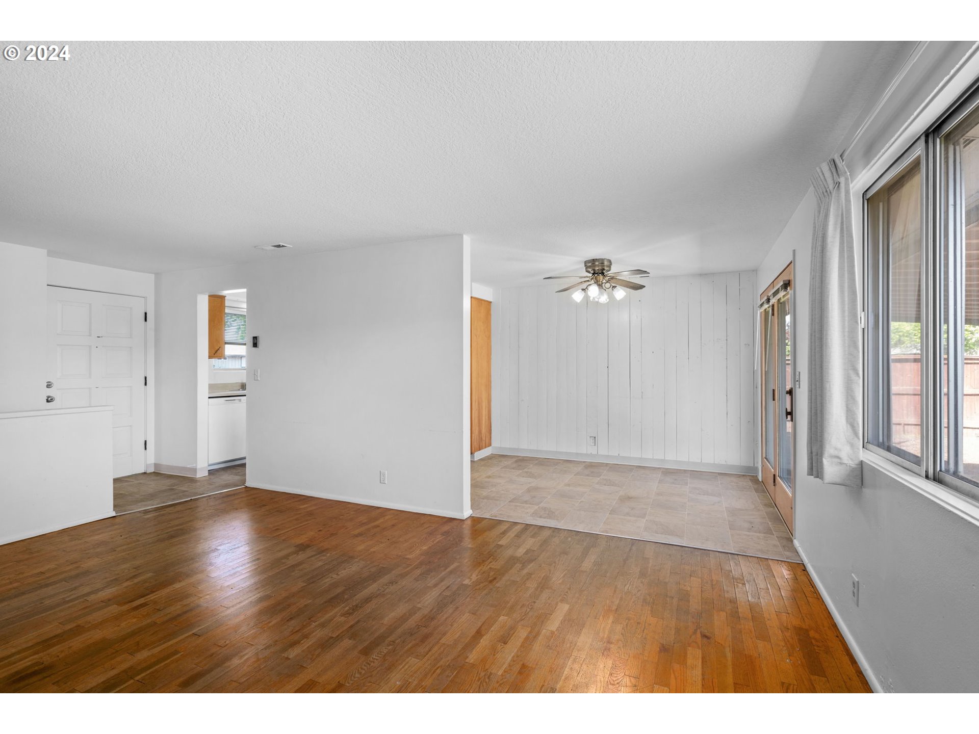 5246 E Street Springfield, OR 97478 - Photo 10 of 26 a view of an empty room with wooden floor and a window