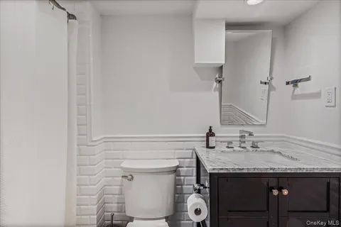 a bathroom with a sink and a toilet