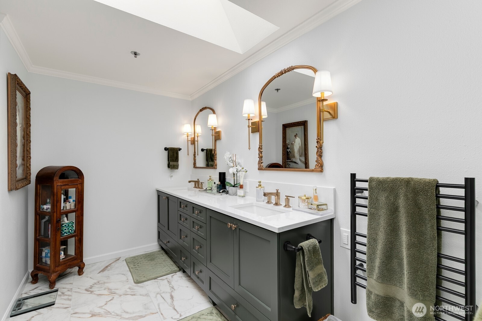 609 7th Avenue North, Unit B304 Edmonds, WA 98020 - Photo 13 of 26 a bathroom with a double vanity sink and a mirror