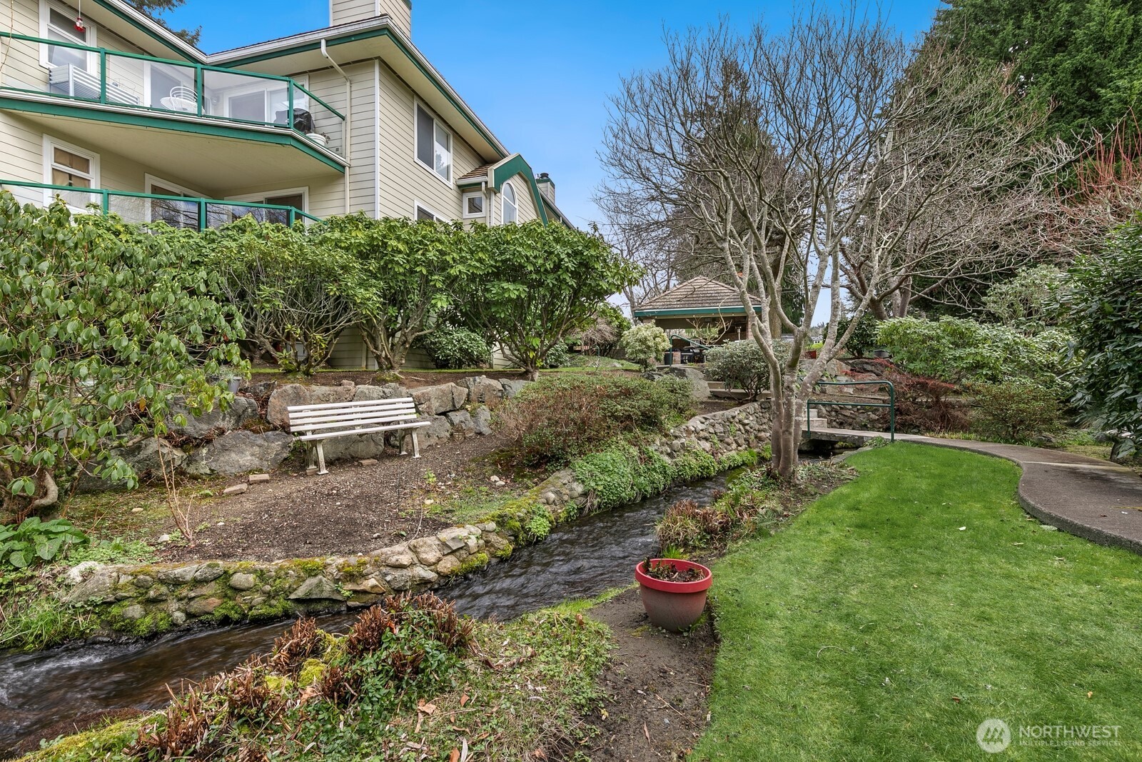 609 7th Avenue North, Unit B304 Edmonds, WA 98020 - Photo 24 of 26 a view of a house with a yard