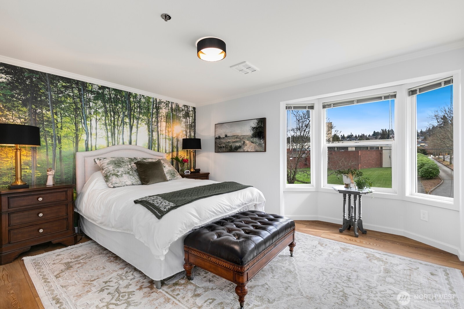 609 7th Avenue North, Unit B304 Edmonds, WA 98020 - Photo 10 of 26 a bedroom with a bed and a large window