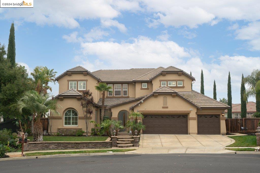 2516 Winged Foot Road Brentwood, CA 94513 - Photo 1 of 1 a front view of a house with a yard and garage