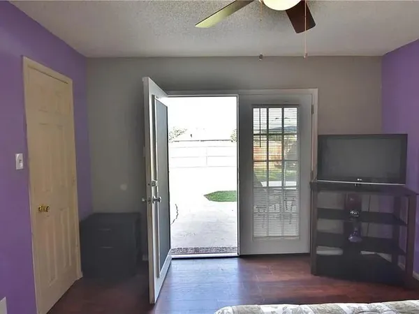 a view of entryway with wooden floor