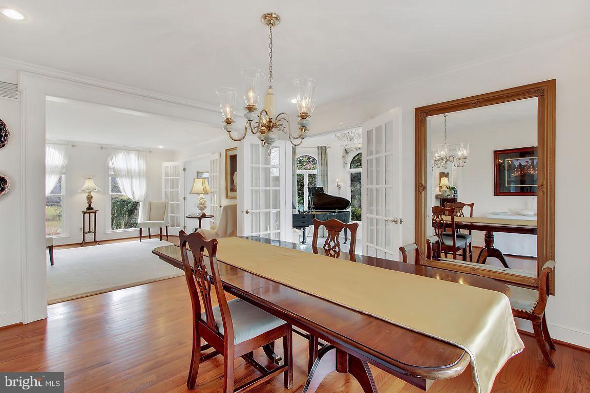 2090 Chapel Road Havre de Grace, MD 21078 - Photo 17 of 29 a view of a dining room with furniture and a chandelier