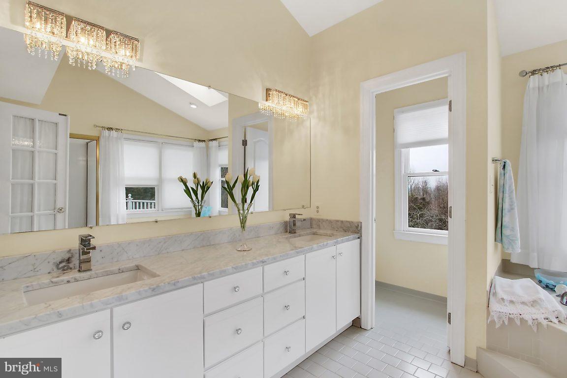 2090 Chapel Road Havre de Grace, MD 21078 - Photo 25 of 29 a bathroom with a granite countertop sink and a mirror