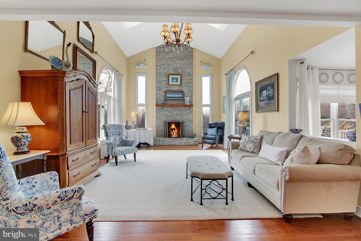 2090 Chapel Road Havre de Grace, MD 21078 - Photo 7 of 29 a living room with furniture fireplace and a large mirror