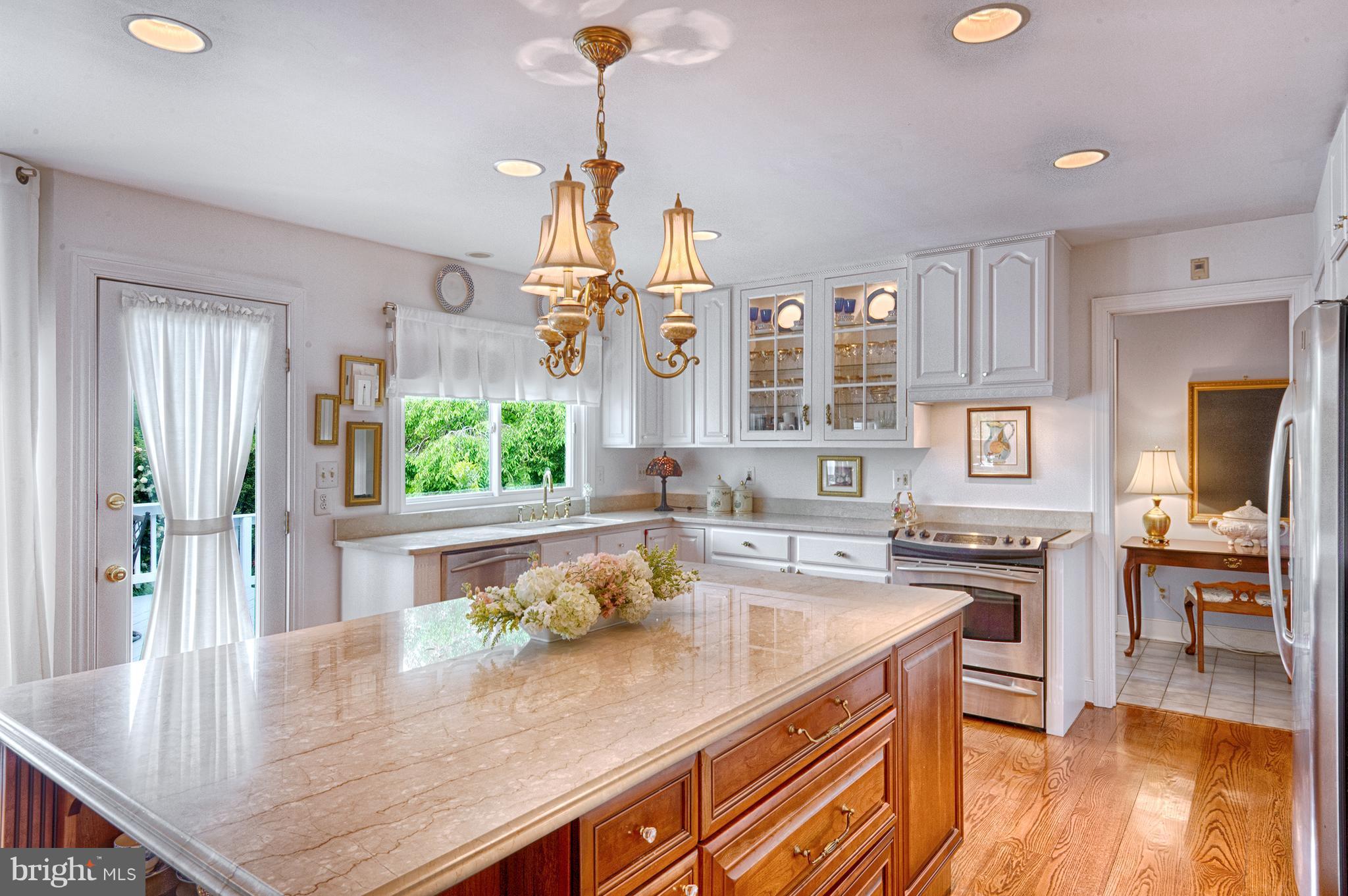 2090 Chapel Road Havre de Grace, MD 21078 - Photo 9 of 29 a kitchen with a table chairs and wooden floor